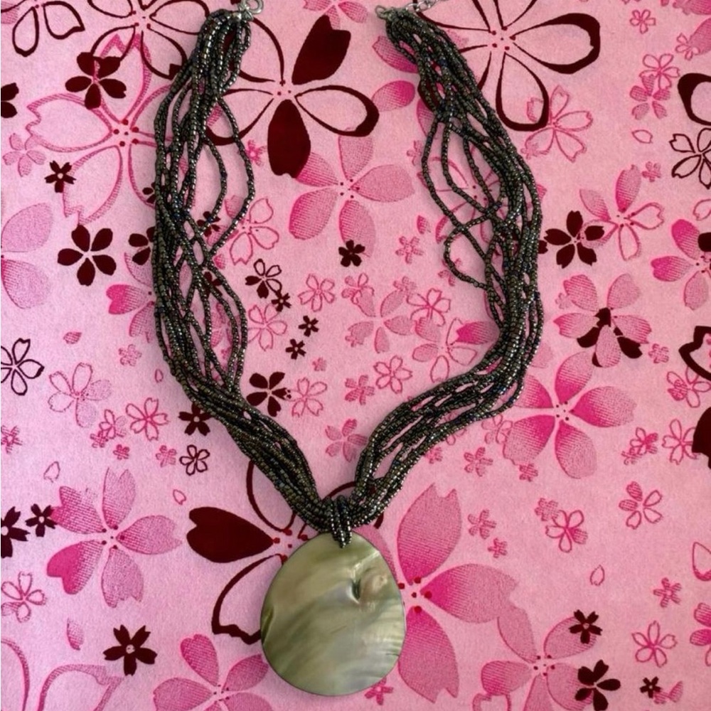 Multi-Strand Gray Beaded Necklace with Iridescent Shell Pendant